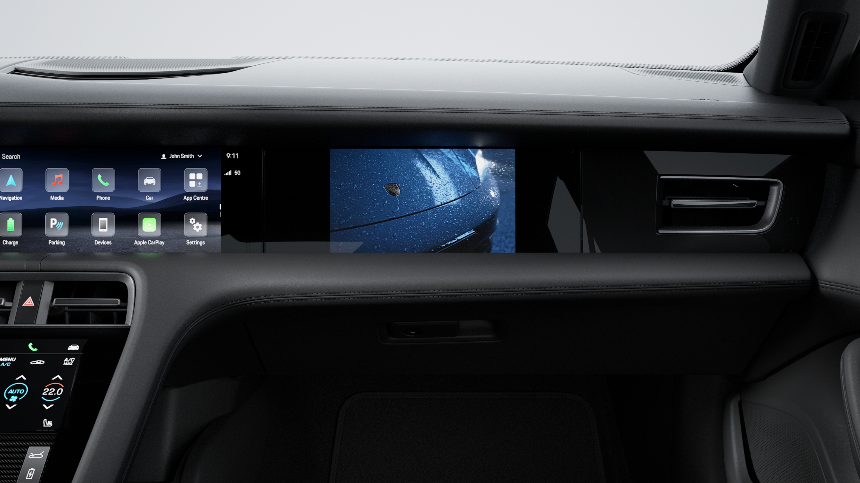 Interior of a Taycan with passenger display switched on.