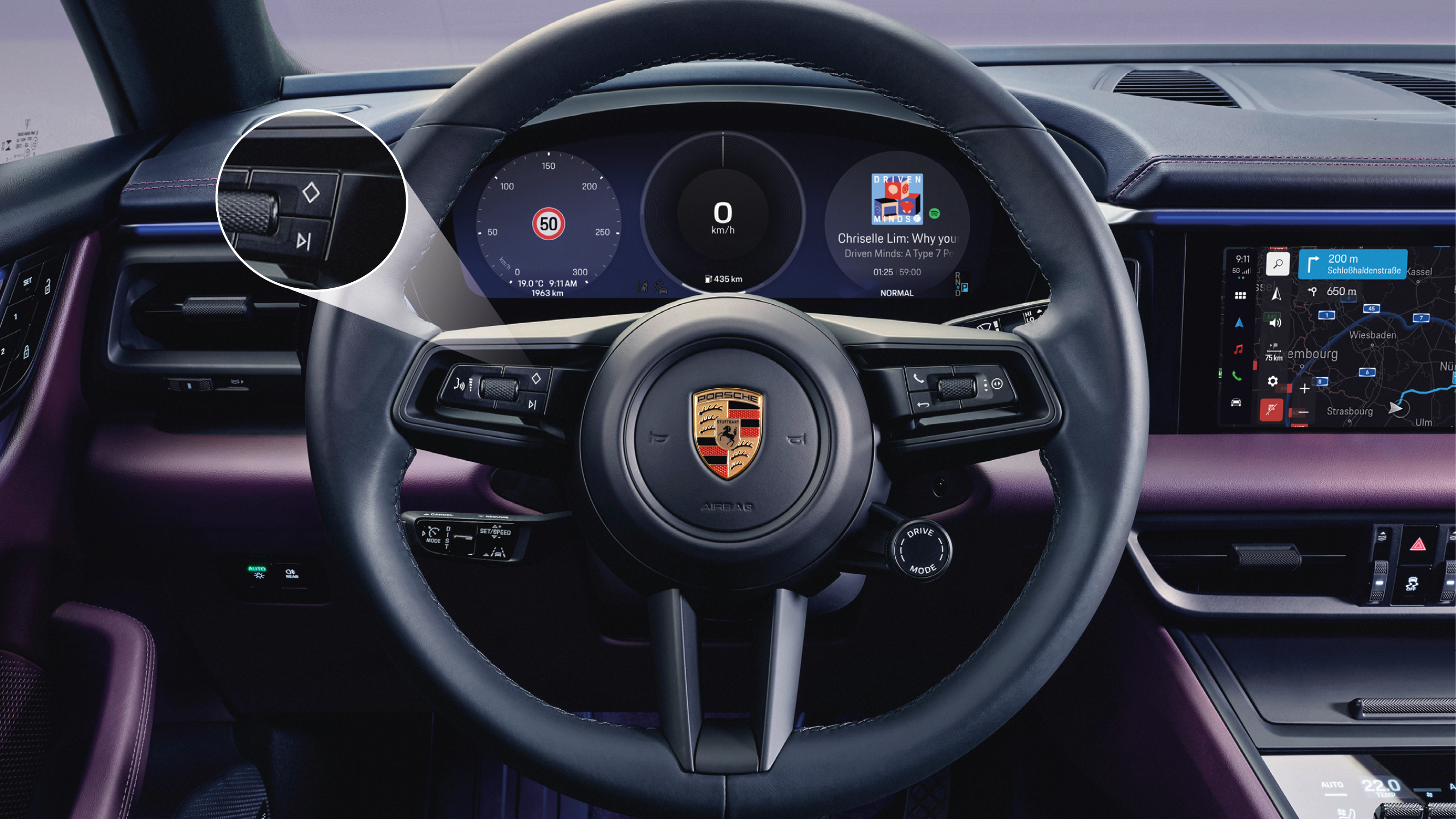 Porsche steering wheel with the Joker button highlighted.